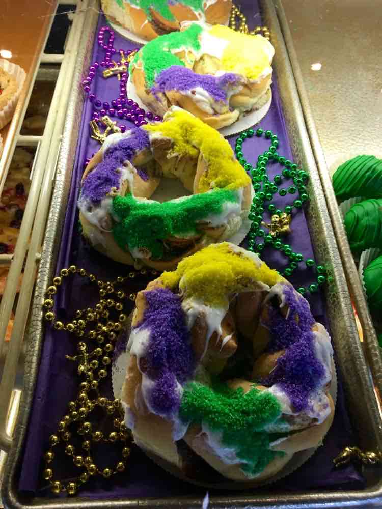 mini king cakes decorated with beads 